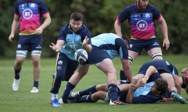 Ali Price fires out a pass during Scotland training at Oriam.