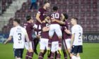 Hearts celebrate Michael Smith's opening against Dundee.