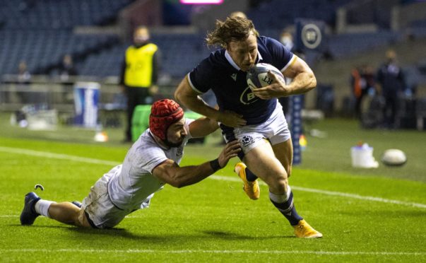 Hamish Watson scores Scotland's third try against Georgia.