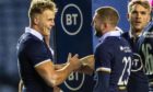 Scotland's Duhan van der Merwe thanks Finn Russell for the assist for his debut try against Georgia.