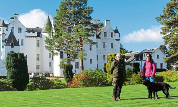 Atholl Estates ranger Julia Duncan with Gayle Ritchie and her dog Toby outside Blair Castle.