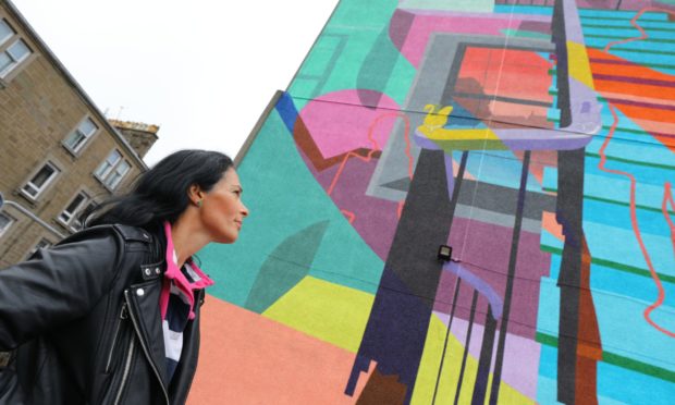 Gayle checks out an OpenClose Dundee mural on Cardean Street.