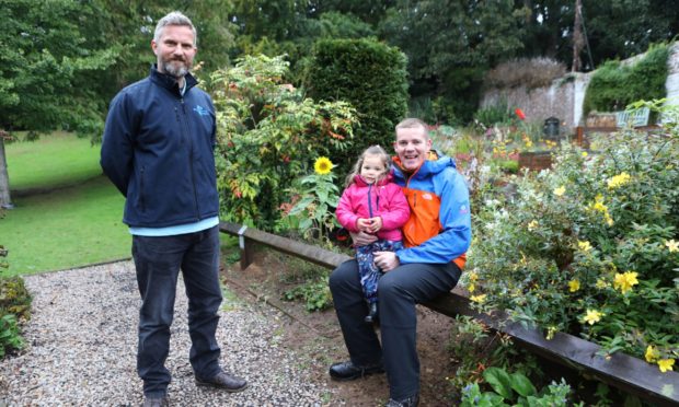 Martin McDonald, Silverburn Park operations manager, left, operations manager at Silverburn Park, with plumber Ross Moreland and his two-year-old daughter Rylee.