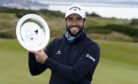 Spain's Adrian Otaegui poses with the trophy after winning The Scottish Championship at Fairmont St Andrews.