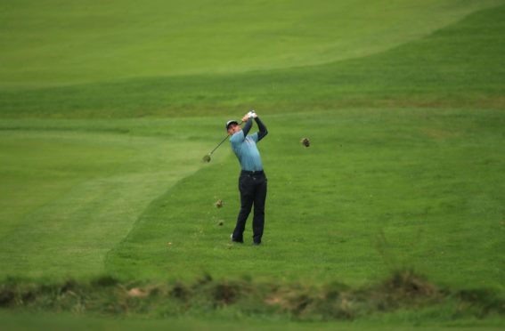 Scotland's Grant Forrest plays from the 4th fairway during day two of the BMW PGA Championship at Wentworth.