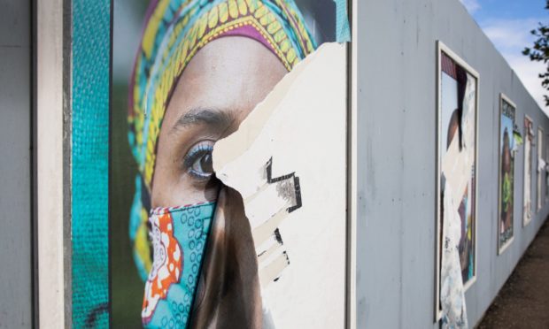 One of the vandalised posters, Slessor Gardens, Dundee,