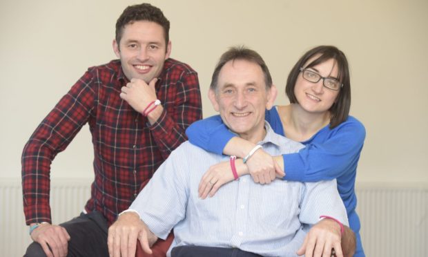 Jo Williamson with twins James and Jennie who have both inherited the rare cancer.