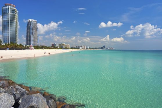 Saints trio met on beach in Miami last year.