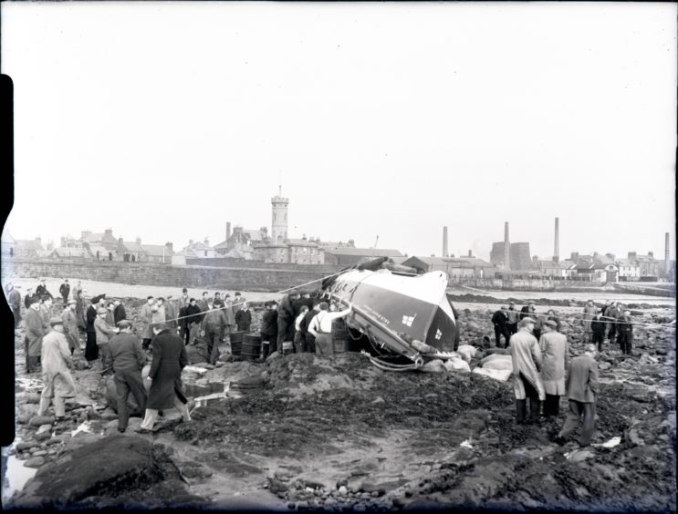 The tragic sight of the RNLB Robert Lindsay following the 1953 disaster.