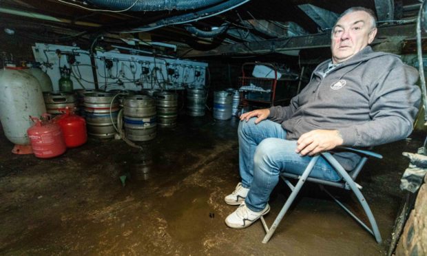 Willie Keenan in his damaged cellar.