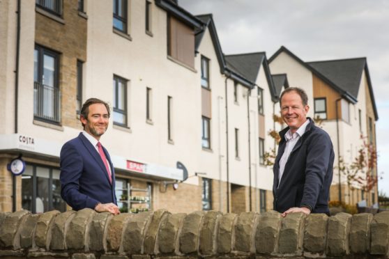 Springfield's Group Architectural Director Mark Hamilton with Central Belt Manging Director Peter Matthews discussing plans for 20 minute neighbourhoods.