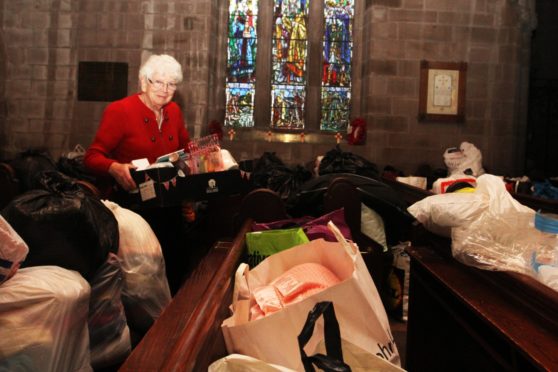 Irene Gillies with items donated during a previous Syria Aid appeal.