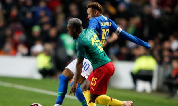 Dundee United new boy Jeando Fuchs had to mark Brazil star Neymar on his Cameroon debut.