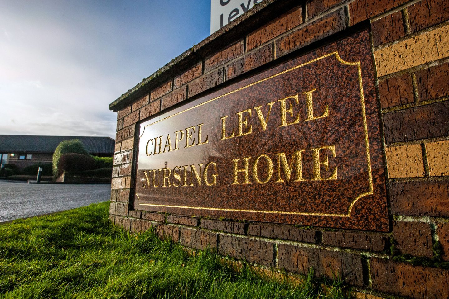 A sign for Chapel Level nursing home