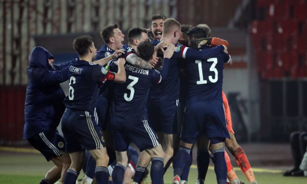 Scotland stars celebrate famous win over Serbia.