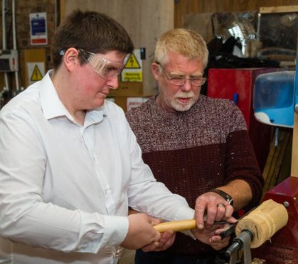 Bob Foulds (right) and an ASC Balbeggie service user at the ASC workshop.