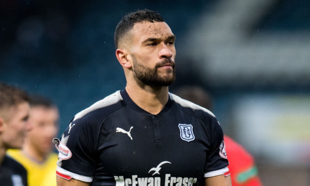 Steven Caulker in action for Dundee.