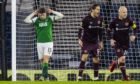 Kevin Nisbet misses penalty for Hibs during Scottish Cup semi-final against Hearts.
