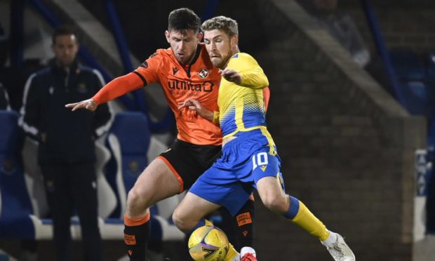 Calum Butcher, left, in action against St Johnstone's David Wotherspoon.