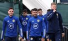 Scotland stars - led by Andy Robertson, Greg Taylor and Scott McTominay - train today ahead of Serbia clash.