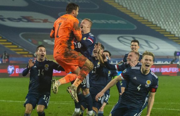 Scotland celebrate in Serbia.