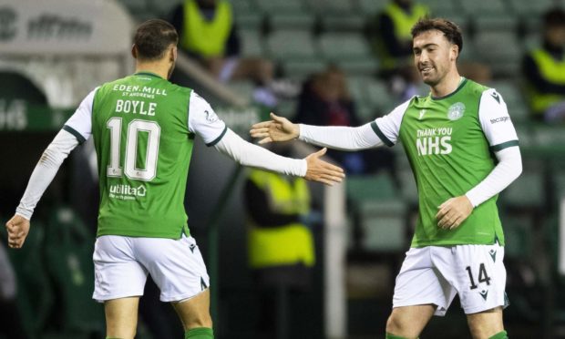 Hibernian's Stevie Mallan celebrates his opening goal against Dundee at Easter Road.