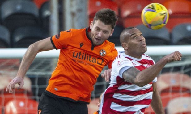 Dundee United defender Ryan Edwards (left) in action against Hamilton.