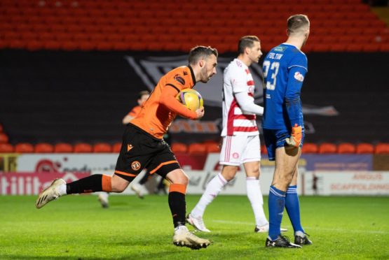 Nicky Clark collects the ball after his equaliser.