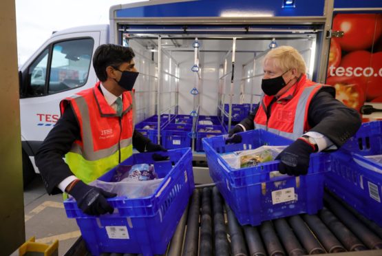 Rishi Sunak and Boris Johnson.