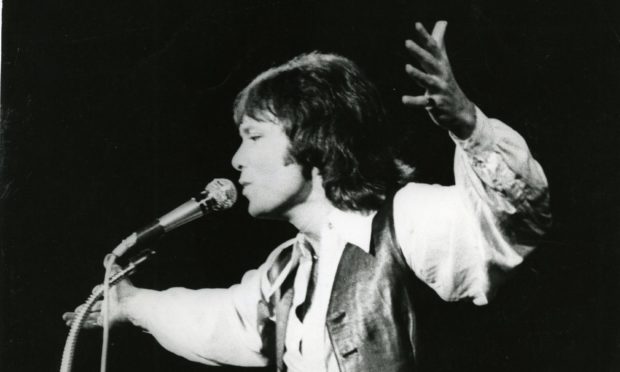 Sir Cliff performing at the Caird Hall in 1978 which was almost 20 years after his first appearance in Dundee in 1959 where the blue flashing lights of the police added to the atmosphere.
