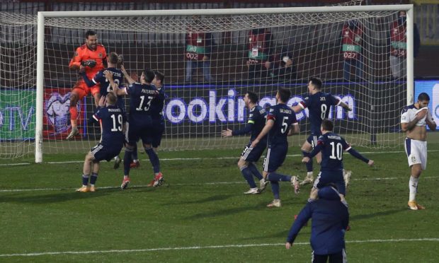 Scotland's players celebrate David Marshall's Belgrade heroics.