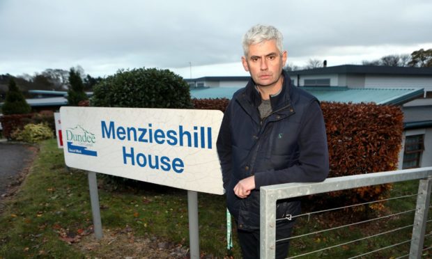 Ian Simpson outside Menzieshill House, where his mum is a resident