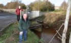 Kinglassie residents John Laing , Dave Murray and Jim Rankin are calling for more to be done to prevent further flooding from Lochty Burn.