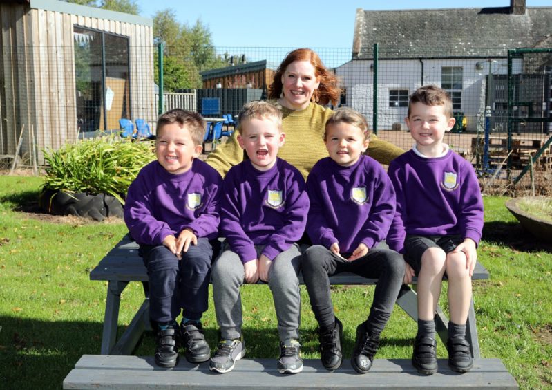 Tealing Primary 1 pupils Zachary Shepherd, Jack Martin, Kirsty Riddell and Connall Moran with teacher Mrs Murray.