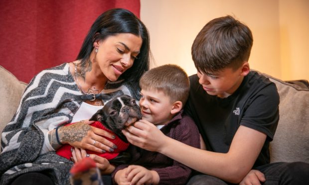 Michelle Morris, Ollie, Jett and Saul are reunited at home.
