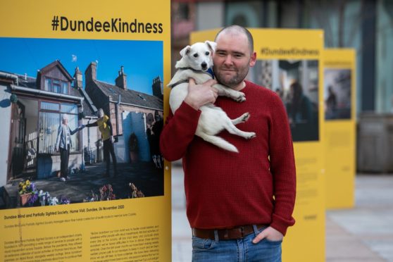 David P Scott with his dog Milli and the exhibition.