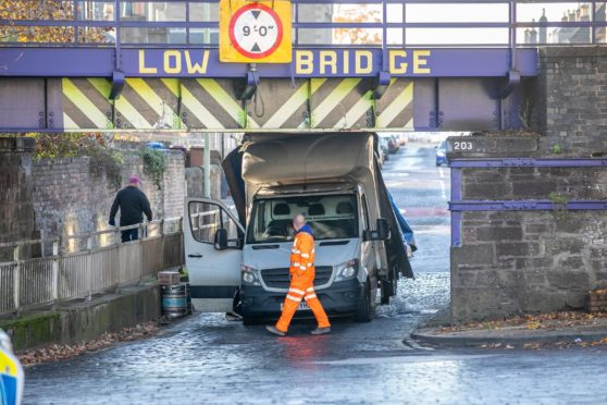 The St Vincent Street railway bridge already has clear signage. Image: Kim Cessford/DC Thomson