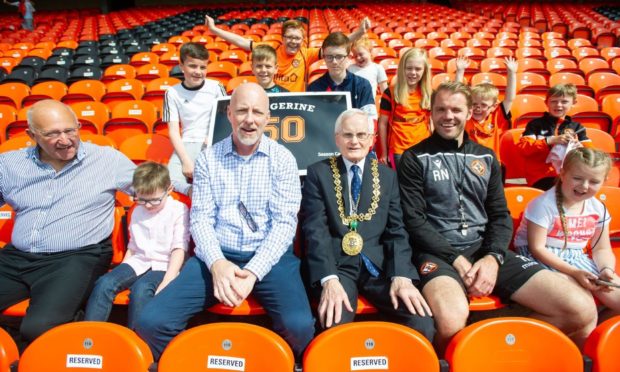 (Centre front L to R) Dundee United Community Trust chairman David Dorward alongside club owner Mark Ogren, Lord Provost Ian Borthwick and former manager Robbie Neilson.