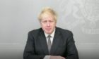 Prime Minister Boris Johnson, who is absolutely not in a cupboard.