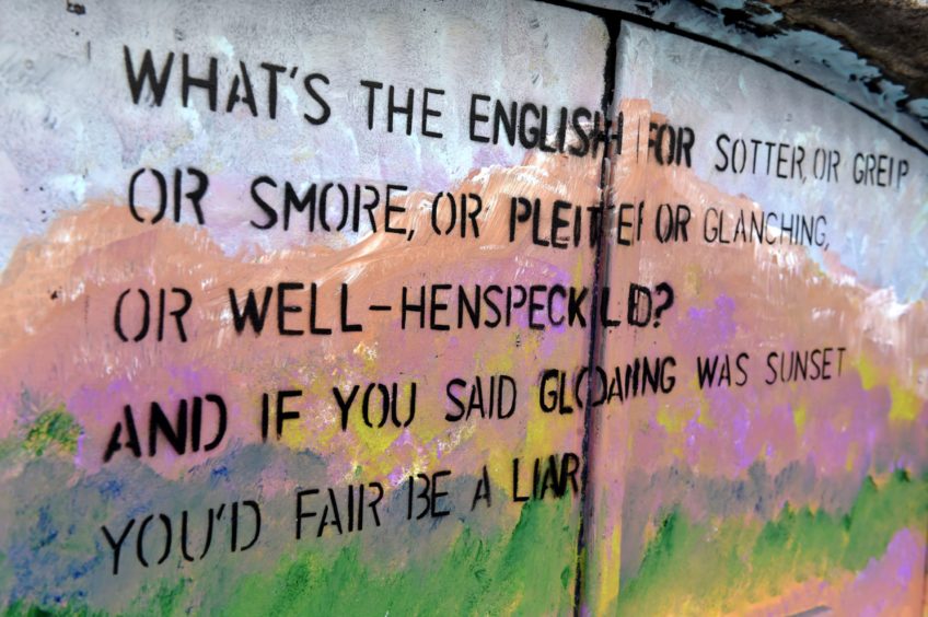 graffiti in Scots reads: "What's the English for sotter or greip or smore, or pleiter or glanching or well - henspeckled? and if you said gloaming was sunset you'd fair be a liar."