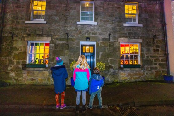 The colourful lights were enjoyed by adults and children alike.