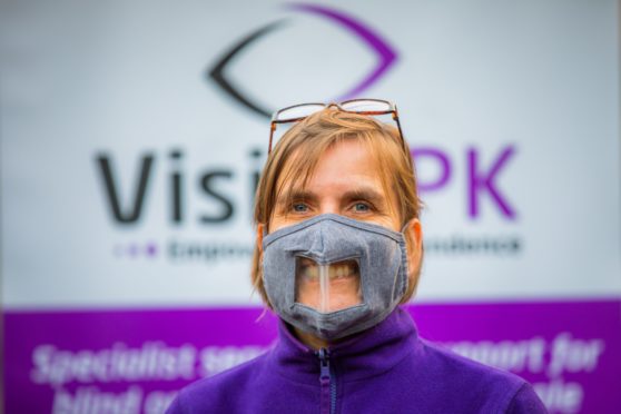 Gill Sutherland (of VisionPK) wearing one of the masks