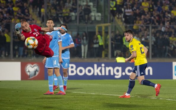 Marc McNulty in action for Scotland against San Marino.