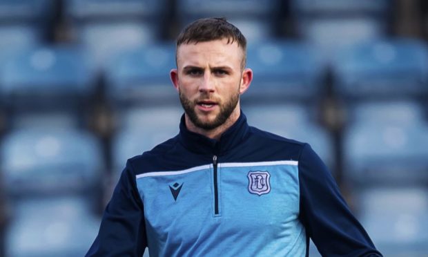 DUMFRIES, SCOTLAND - FEBRUARY 22: Dundees Christie Elliott ahead of the Ladbrokes Championship match between Queen of the South and Dundee, at Palmerston Park, on February 22, 202, in Dumfries, Scotland. (Photo by Roddy Scott / SNS Group)