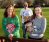 From left: Relay for life vice chairwoman, Margaret Craig, chairman Ian Angus and Megan Craig with dog Nala.