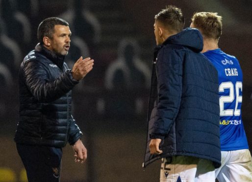 Callum Davidson congratulates his players at Motherwell.