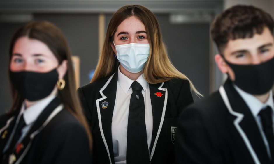 Dundee youngsters began wearing face coverings in class last week. Pictured at Baldragon Academy are head girl Sophie Booth, Amy McDonald and house captain Matthew Rutter.