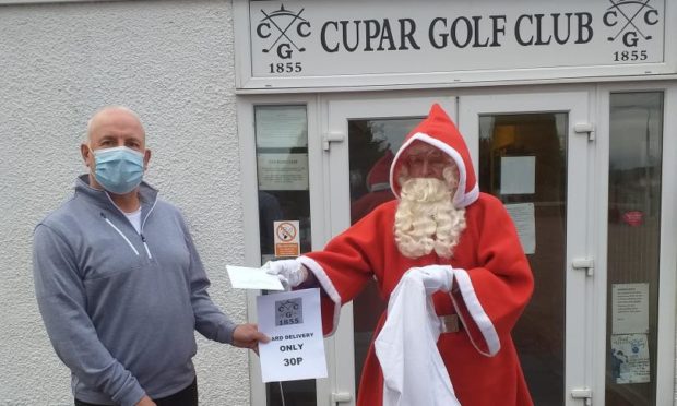 Cupar Golf Club Captain Keith Ridley with 'Santa'