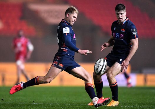 Jaco van der Walt kicks clear playing for Edinburgh at Llanelli earlier this month.