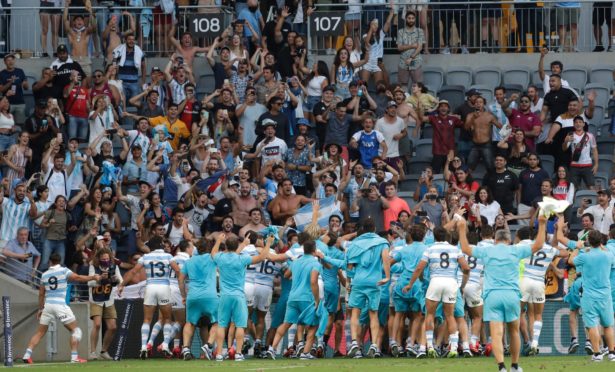 The Pumas celebrate with their fans after beating New Zealand in Sydney.